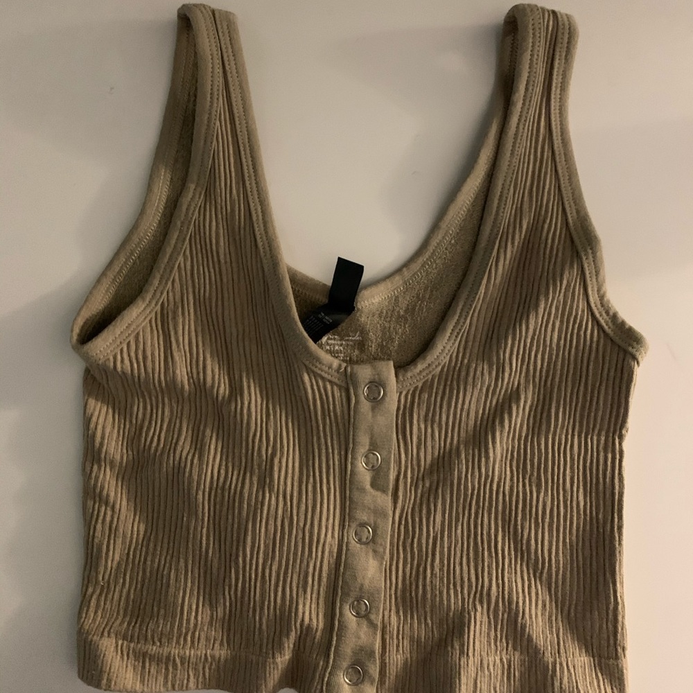 Urban Outfitters out from under cropped tank top